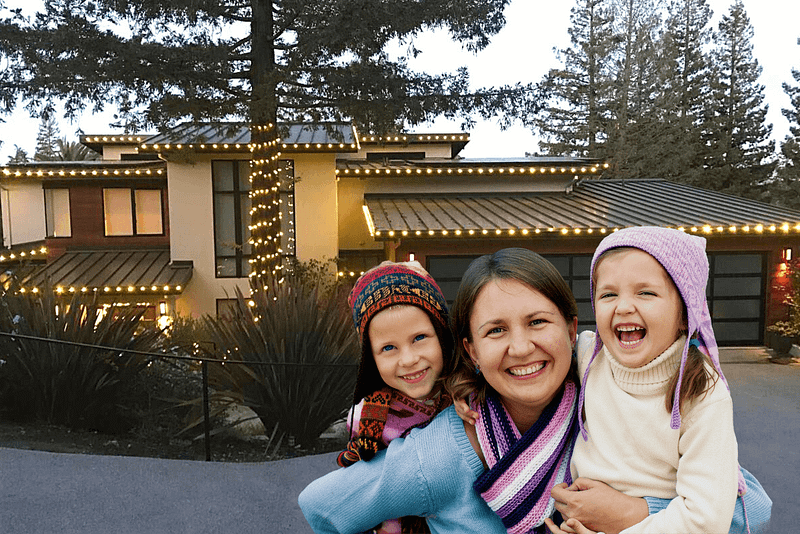 Christmas light installation and a happy family Electric Elf brandon Parker